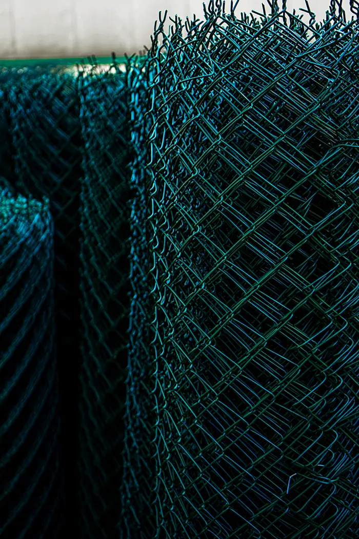 Green PVC-coated chain-link mesh