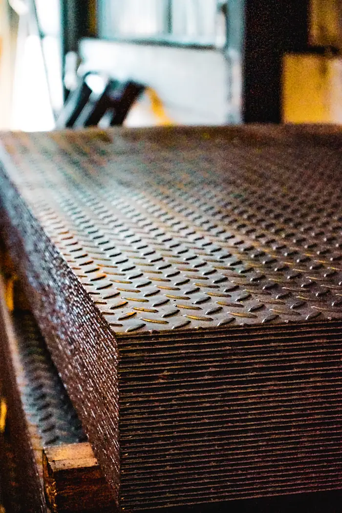 Chequer tread sheet stack, raised pattern visible