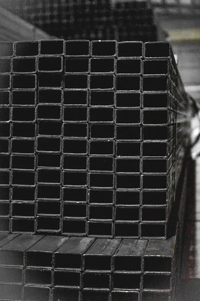 Wall of stacked rectangular hollow sections