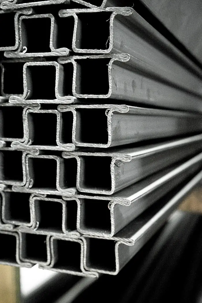 Cold-formed lipped steel frame profiles stacked